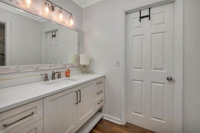 103 Travellers Way, Saint Simons Island, GA 31522 - bathroom with vanity, wood finished floors, and crown molding