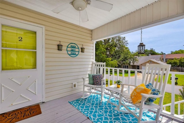 103 Travellers Way, Saint Simons Island, GA 31522 - porch with a ceiling fan