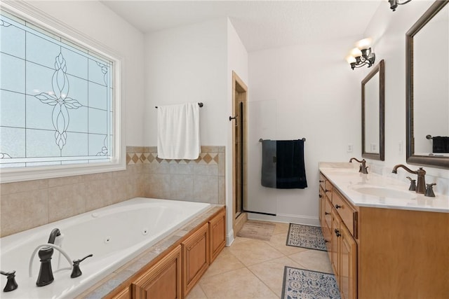 11 Bice Ct, Waverly, GA 31565 - full bath with tile patterned flooring, a jetted tub, double vanity, and a stall shower