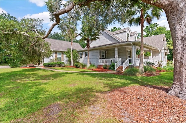 11 Bice Ct, Waverly, GA 31565 - view of front facade featuring covered porch and a front lawn
