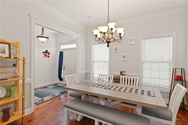 11 Bice Ct, Waverly, GA 31565 - dining area with a chandelier, hardwood / wood-style flooring, and crown molding