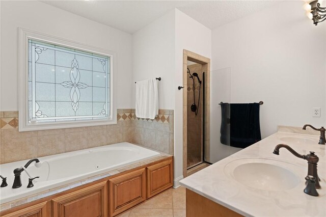 11 Bice Ct, Waverly, GA 31565 - full bath with a bath, a shower stall, double vanity, and tile patterned flooring