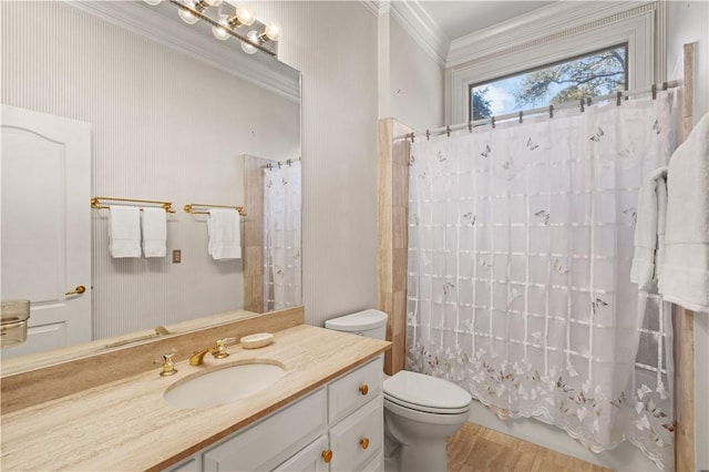 full bathroom with shower / bath combination with curtain, ornamental molding, vanity, hardwood / wood-style flooring, and toilet