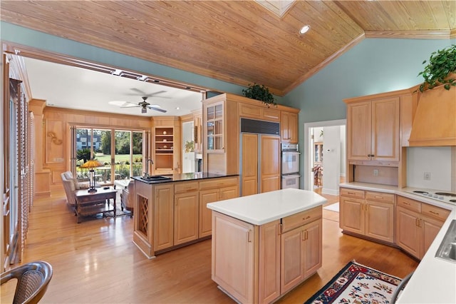 kitchen featuring light brown cabinets, a kitchen island, wood ceiling, and paneled built in fridge