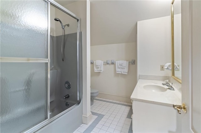 full bathroom featuring tile patterned flooring, vanity, bath / shower combo with glass door, and toilet