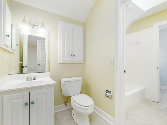 full bathroom featuring tile patterned floors, vanity, bathing tub / shower combination, lofted ceiling with skylight, and toilet