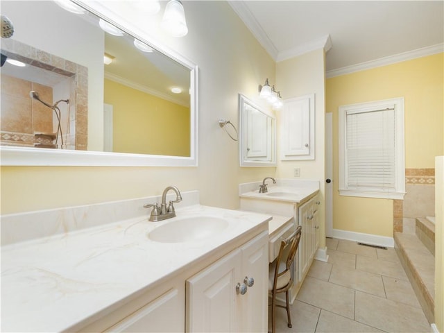 bathroom featuring tile patterned flooring, vanity, and ornamental molding