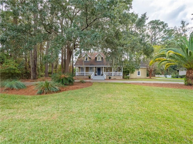 view of front of home featuring a porch and a front yard