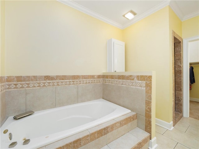 bathroom featuring tiled bath, tile patterned floors, and ornamental molding