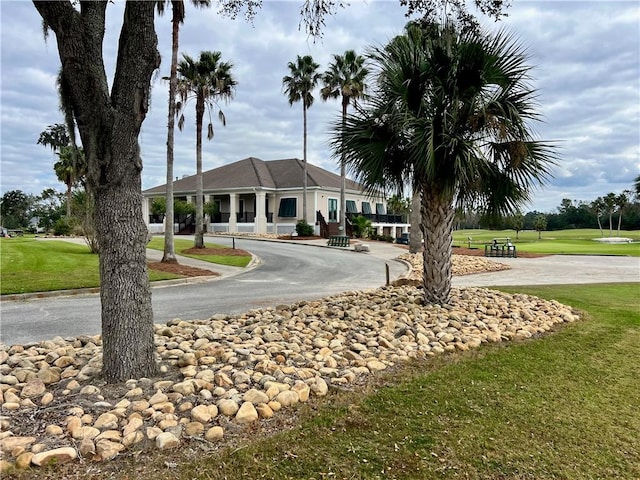 view of community featuring a lawn