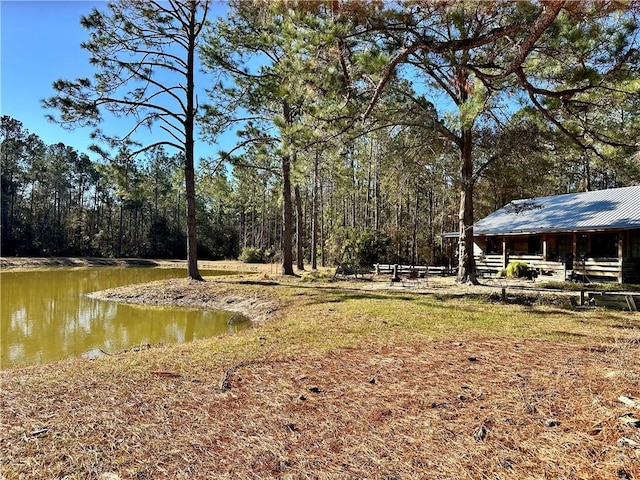 view of yard with a water view