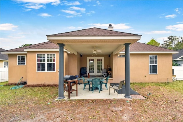 375 Wellington Pl, Brunswick, GA 31523 - back of property featuring a ceiling fan, stucco siding, french doors, a shingled roof, and a patio
