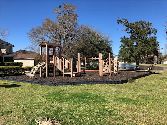 communal playground featuring a yard