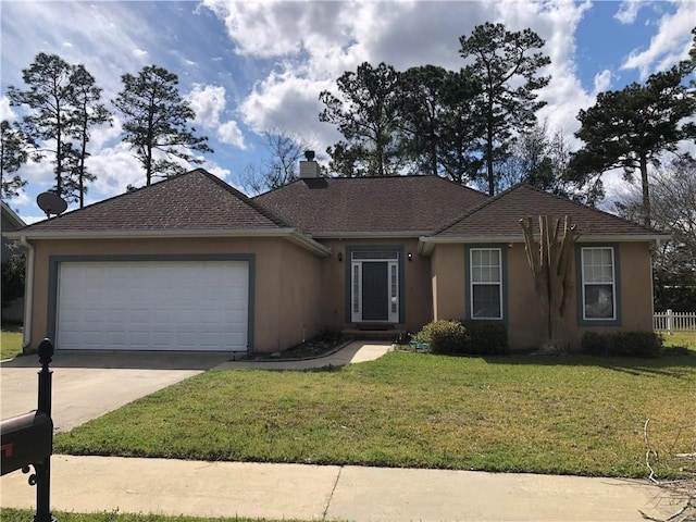 single story home featuring an attached garage, a front lawn, stucco siding, a chimney, and driveway