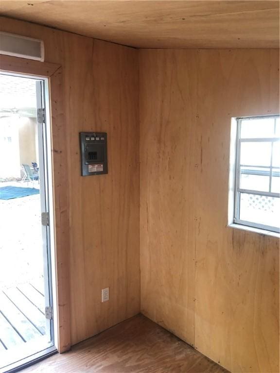 375 Wellington Pl, Brunswick, GA 31523 - unfurnished room with wood finished floors and wood walls