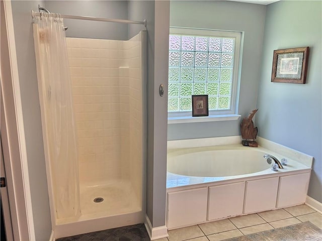 375 Wellington Pl, Brunswick, GA 31523 - full bath with a shower stall, a bath, and tile patterned flooring