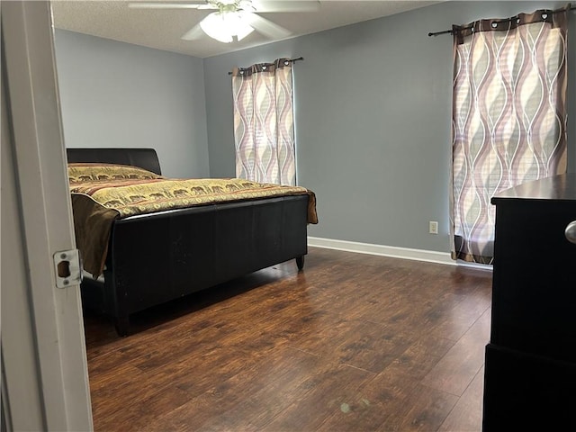 375 Wellington Pl, Brunswick, GA 31523 - bedroom featuring ceiling fan, dark wood-style flooring, baseboards, and a textured ceiling