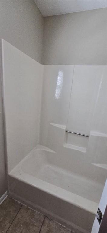 bathroom featuring tile patterned floors and shower / bathing tub combination