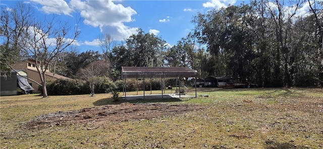 view of yard with a carport