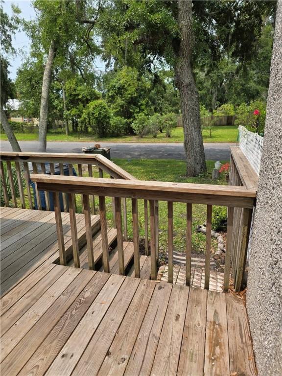 900 Lanier Blvd Unit 6, Brunswick, GA 31520 - wooden terrace featuring view of scattered trees