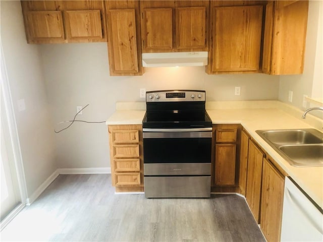900 Lanier Blvd Unit 6, Brunswick, GA 31520 - kitchen featuring stainless steel electric range, range hood, dishwasher, and light wood-style floors