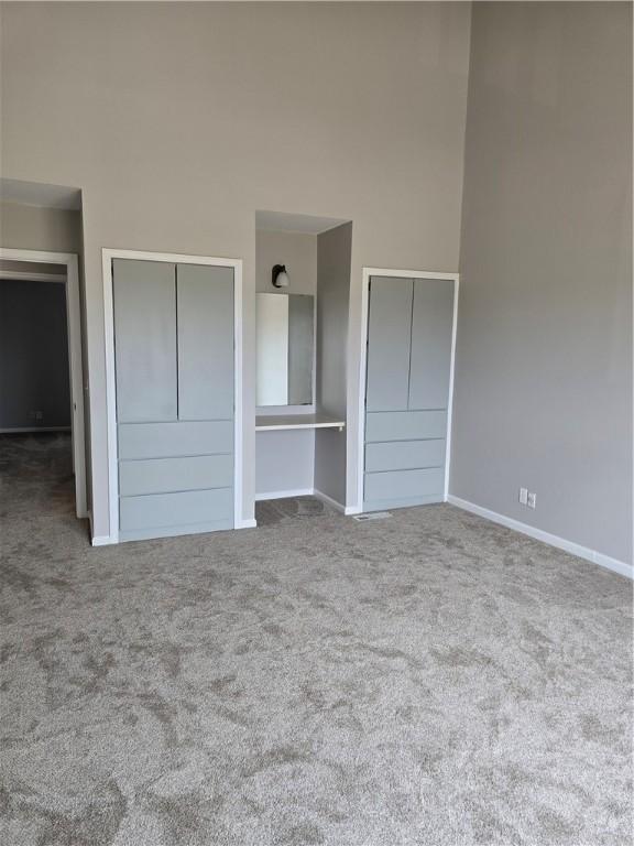 900 Lanier Blvd Unit 6, Brunswick, GA 31520 - unfurnished bedroom with carpet floors and a high ceiling
