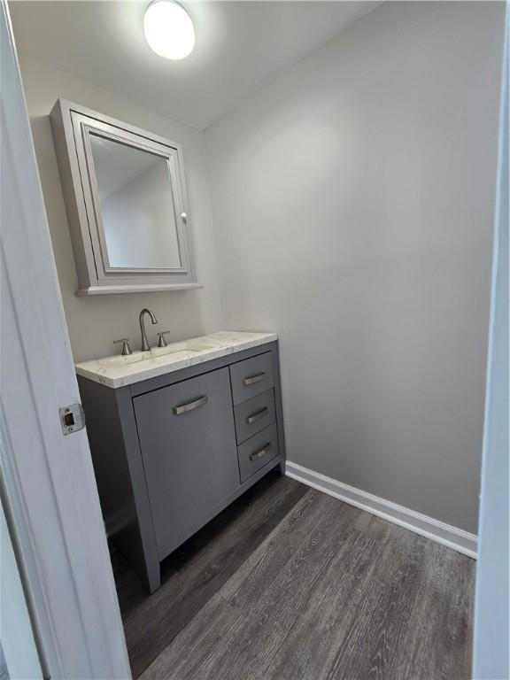 900 Lanier Blvd Unit 6, Brunswick, GA 31520 - bathroom featuring wood finished floors and vanity
