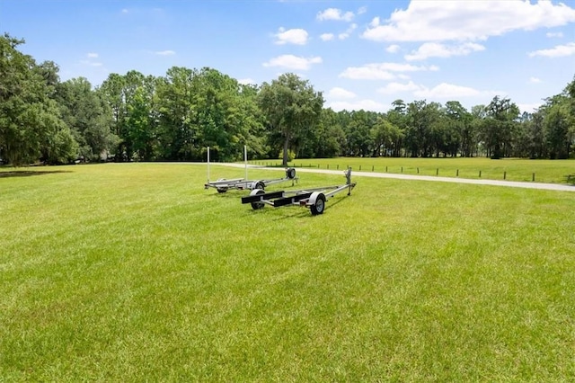340 Oak Grove Island Dr, Brunswick, GA 31523 - view of community featuring a lawn and a forest view