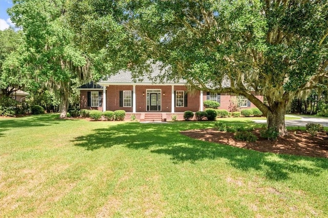 340 Oak Grove Island Dr, Brunswick, GA 31523 - single story home with a front lawn and brick siding