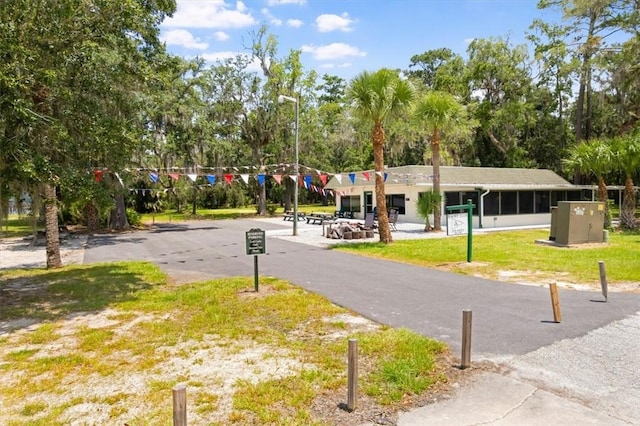 340 Oak Grove Island Dr, Brunswick, GA 31523 - view of street featuring street lights and view of scattered trees