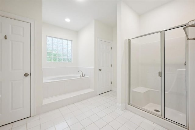 340 Oak Grove Island Dr, Brunswick, GA 31523 - bathroom with a bath, a stall shower, and tile patterned floors
