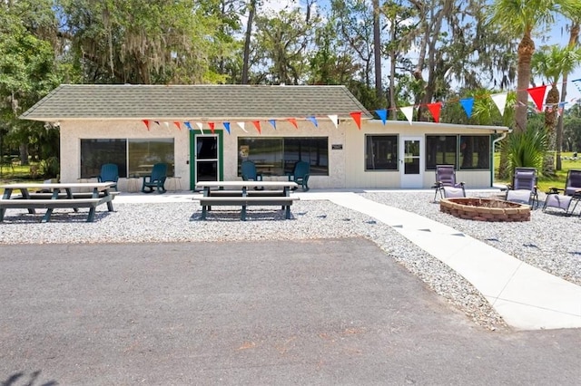 340 Oak Grove Island Dr, Brunswick, GA 31523 - view of property's community featuring an outdoor fire pit and a patio