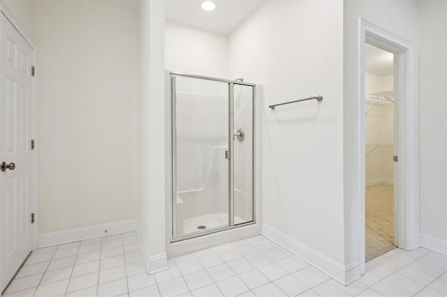 340 Oak Grove Island Dr, Brunswick, GA 31523 - bathroom featuring a stall shower, a spacious closet, tile patterned flooring, and recessed lighting