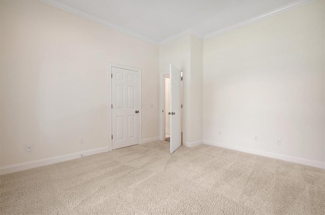 340 Oak Grove Island Dr, Brunswick, GA 31523 - spare room with crown molding and light colored carpet