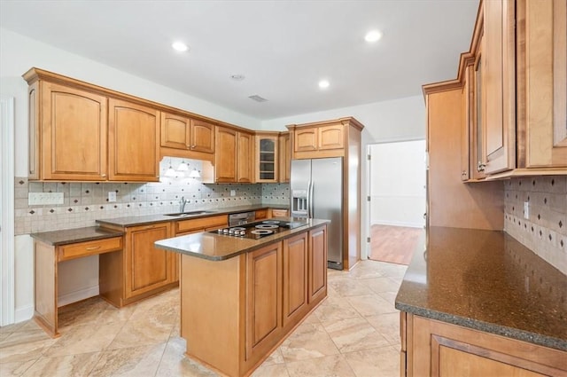 340 Oak Grove Island Dr, Brunswick, GA 31523 - kitchen with stainless steel appliances, a center island, backsplash, glass insert cabinets, and dark stone countertops