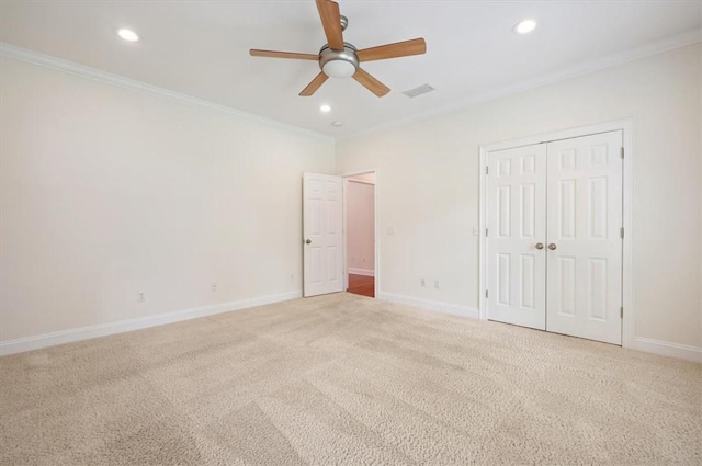 340 Oak Grove Island Dr, Brunswick, GA 31523 - unfurnished bedroom featuring carpet flooring, crown molding, recessed lighting, a closet, and ceiling fan