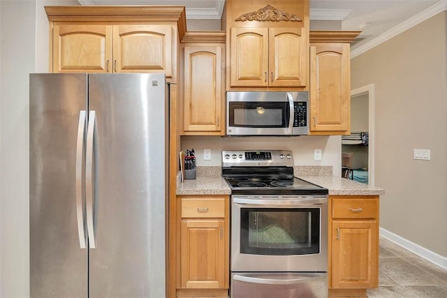 kitchen featuring baseboards, light brown cabinets, ornamental molding, light tile patterned flooring, and appliances with stainless steel finishes