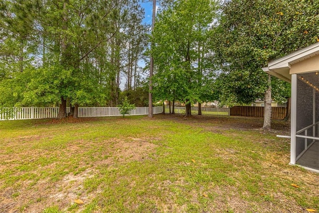 view of yard featuring a fenced backyard