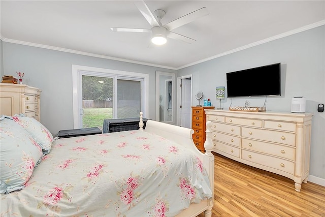 bedroom featuring ceiling fan, light hardwood / wood-style floors, and crown molding