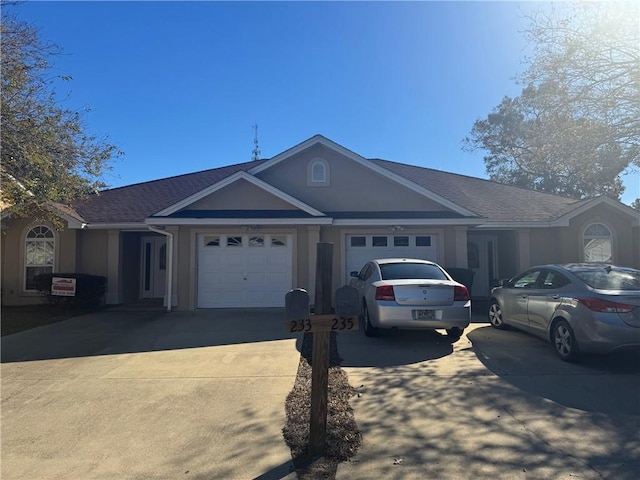 ranch-style home with a garage