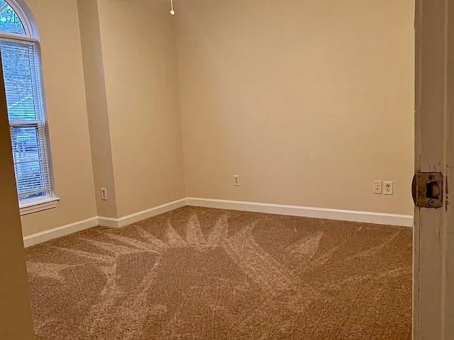 view of carpeted spare room