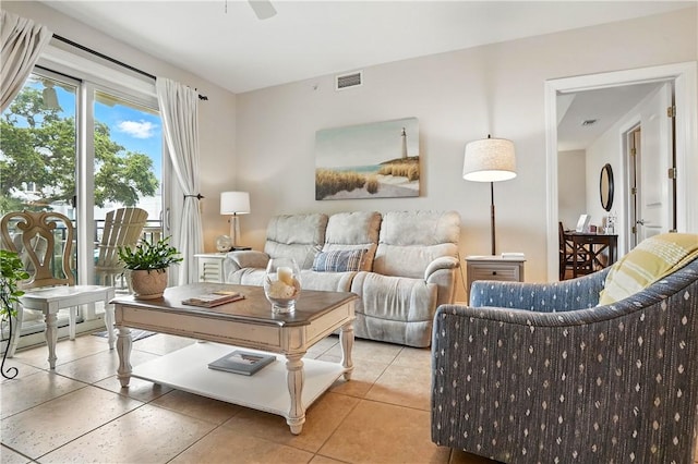 760 Ocean Blvd Unit 201, Saint Simons Island, GA 31522 - tiled living area featuring ceiling fan