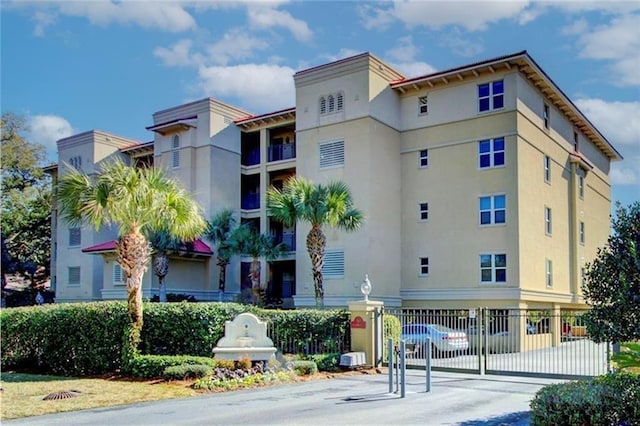 760 Ocean Blvd Unit 201, Saint Simons Island, GA 31522 - view of property featuring a carport