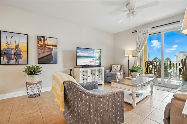 760 Ocean Blvd Unit 201, Saint Simons Island, GA 31522 - tiled living area with ceiling fan and baseboards