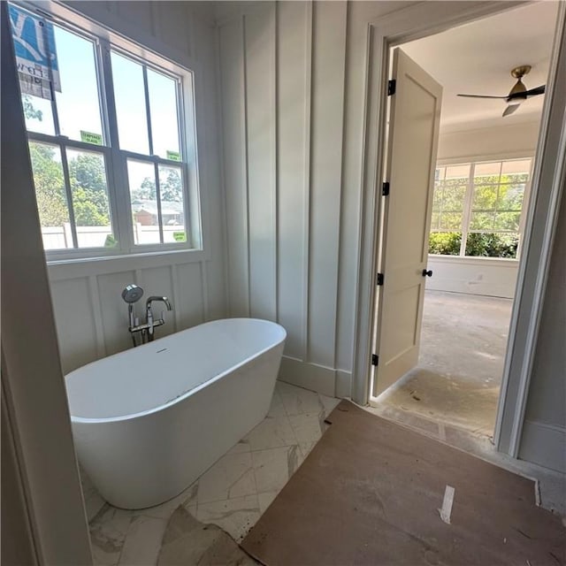 638 Dellwood Ave, Saint Simons Island, GA 31522 - full bath with plenty of natural light, a soaking tub, and marble finish floors
