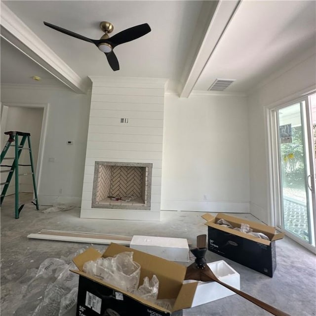 638 Dellwood Ave, Saint Simons Island, GA 31522 - living area with ornamental molding, ceiling fan, a fireplace, and beam ceiling