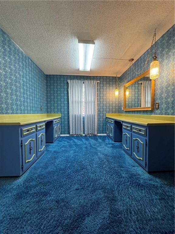 123 Blount St, Reidsville, GA 30453 - unfurnished bedroom with carpet floors, a closet, and a textured ceiling