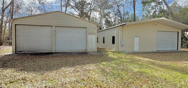 garage with a yard