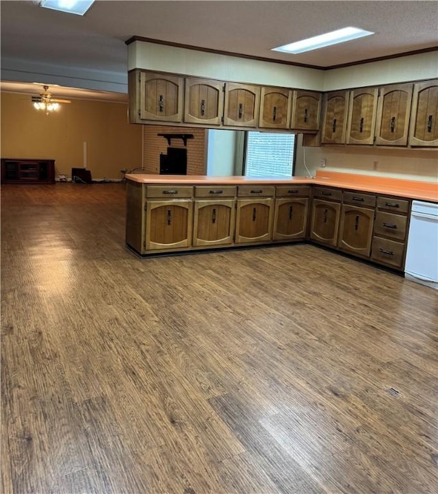 kitchen featuring white dishwasher, dark hardwood / wood-style flooring, ornamental molding, and ceiling fan
