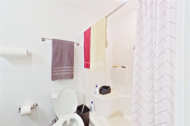 4718 Otter Creek Cir, Blackshear, GA 31516 - bathroom with toilet and shower / bathtub combination with curtain
